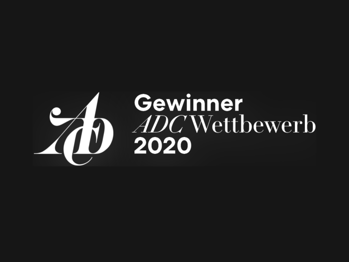 Auf einem Schwarzen Hintergrund ist in weißer Schrift ADC Gewinner geschrieben