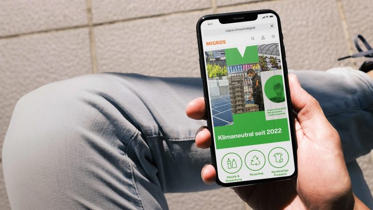 Smartphone screen with teaser of the Migros sustainability hub