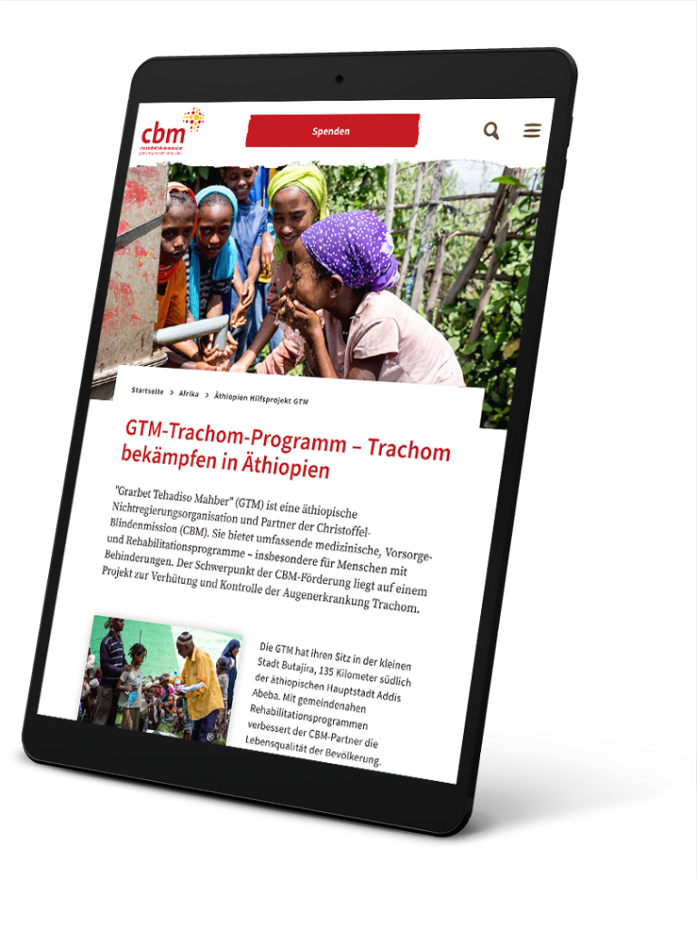 Tablet screen with the website of the Christian Blind Mission