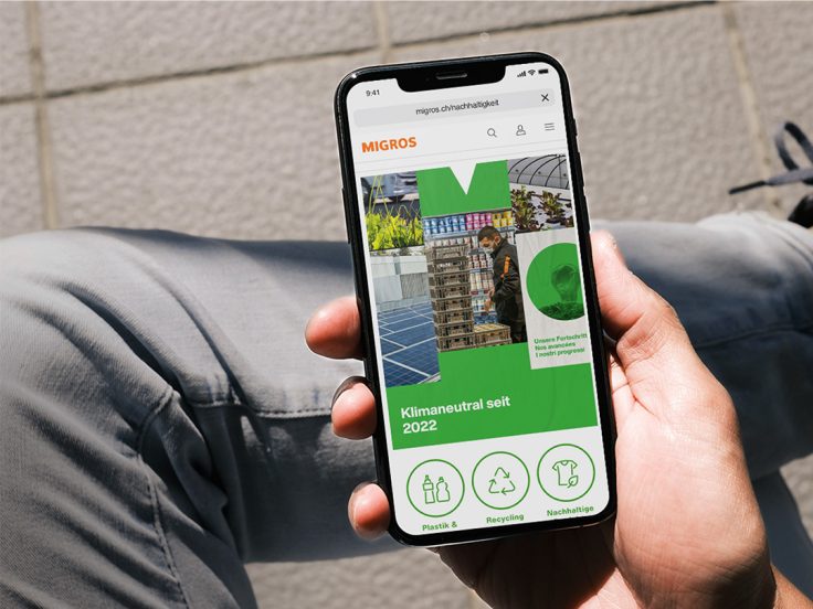 Smartphone screen with teaser of the Migros sustainability hub