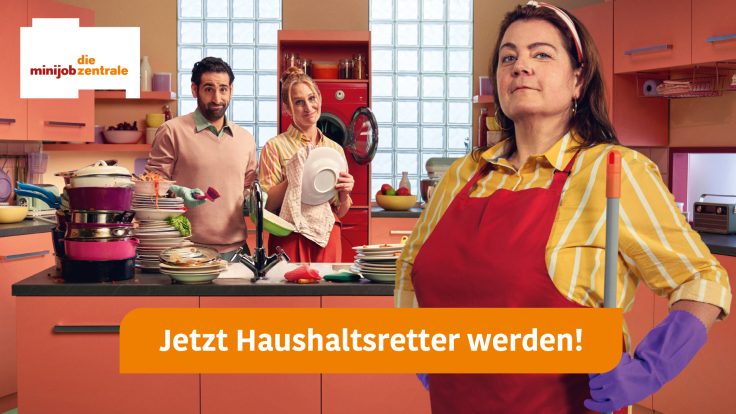 Housekeeper in kitchen in front of dirty dishes