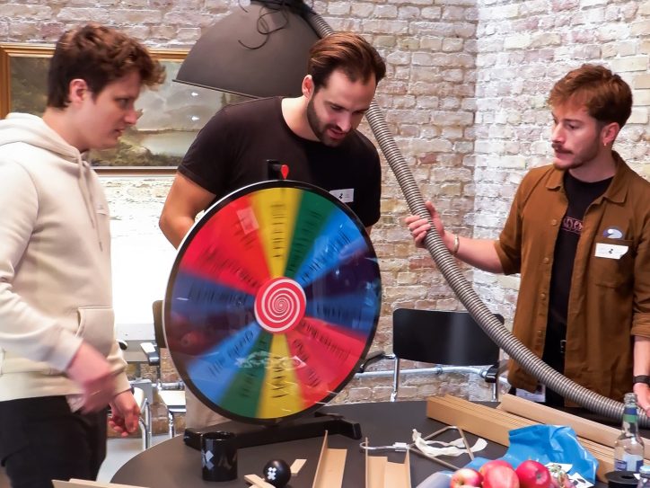Collegues working on Rube-Goldberg-Machine