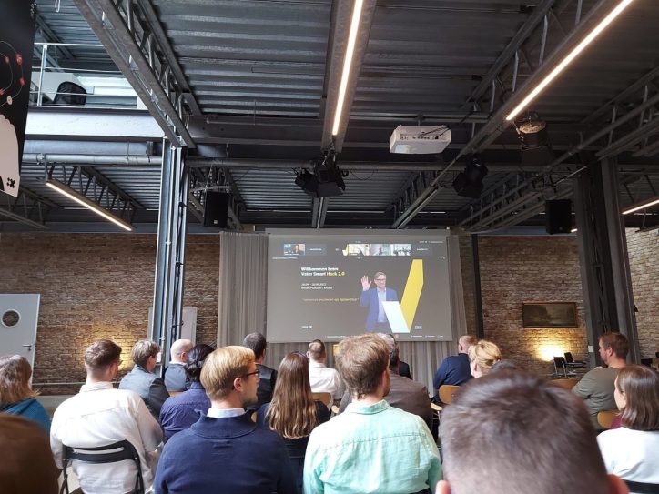 Picture of People looking at presentation. View from the back