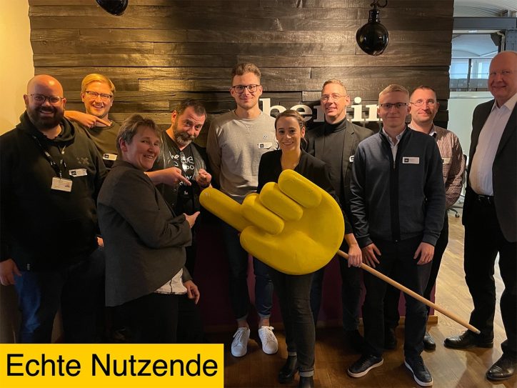 Big Yellow Puppet-Finger pointing on team members. Caption: 