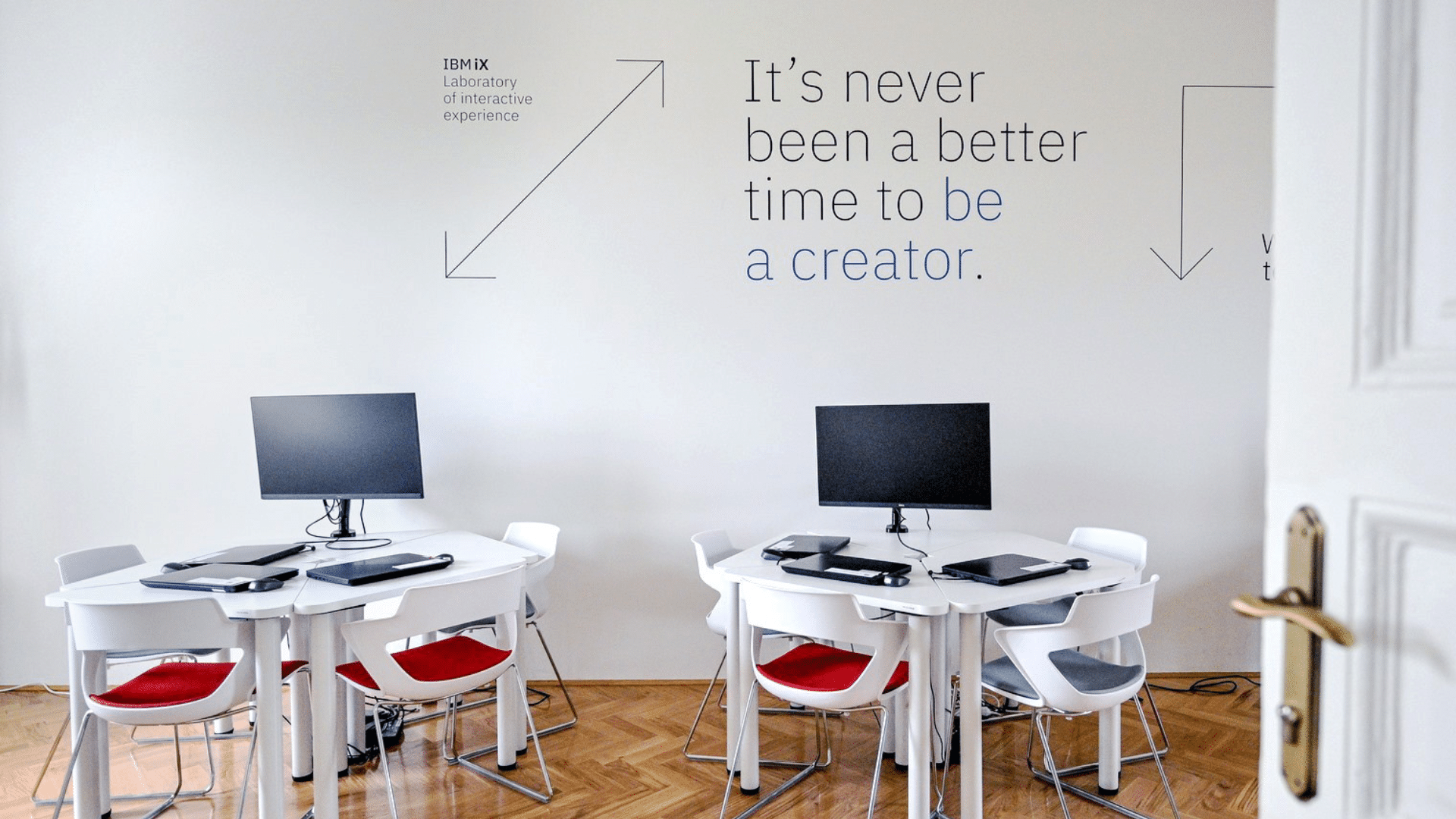 Two chairs with desks, office view and a quote: 