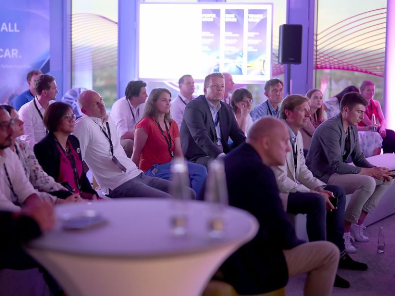 Crowd gathered at the IBM Auto Lab.