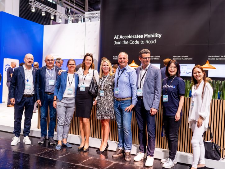 Image description: A group of diverse individuals discussing and collaborating at IAA Mobility 2023, symbolizing a collective effort towards a more sustainable future of mobility.